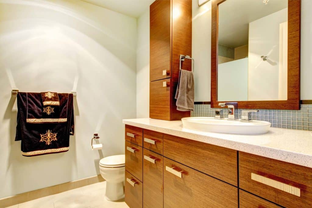 Classic bathroom interior with modern cabinets - Big Easy Bathrooms