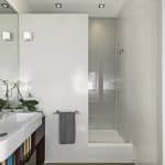 interiors shots of a modern bathroom in the foreground the contertop washbasin on the bottom the masonry shower cubicle