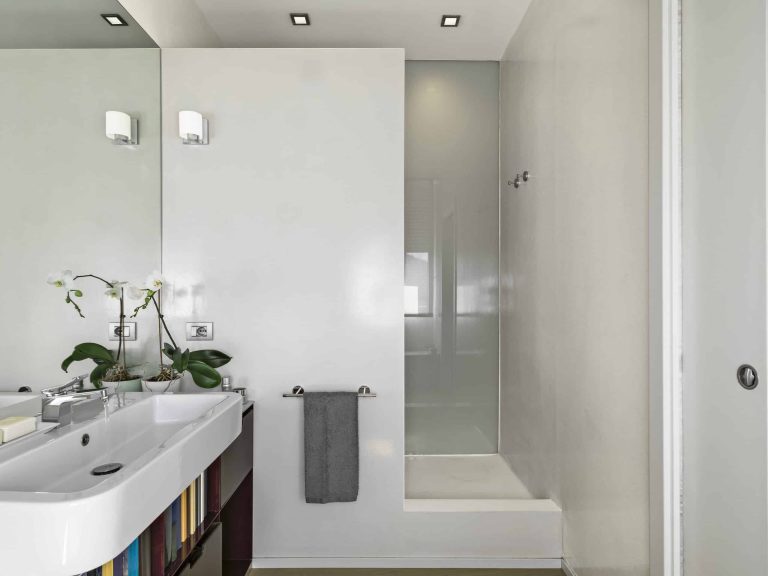 Modern bathroom interior with a tiled shower area